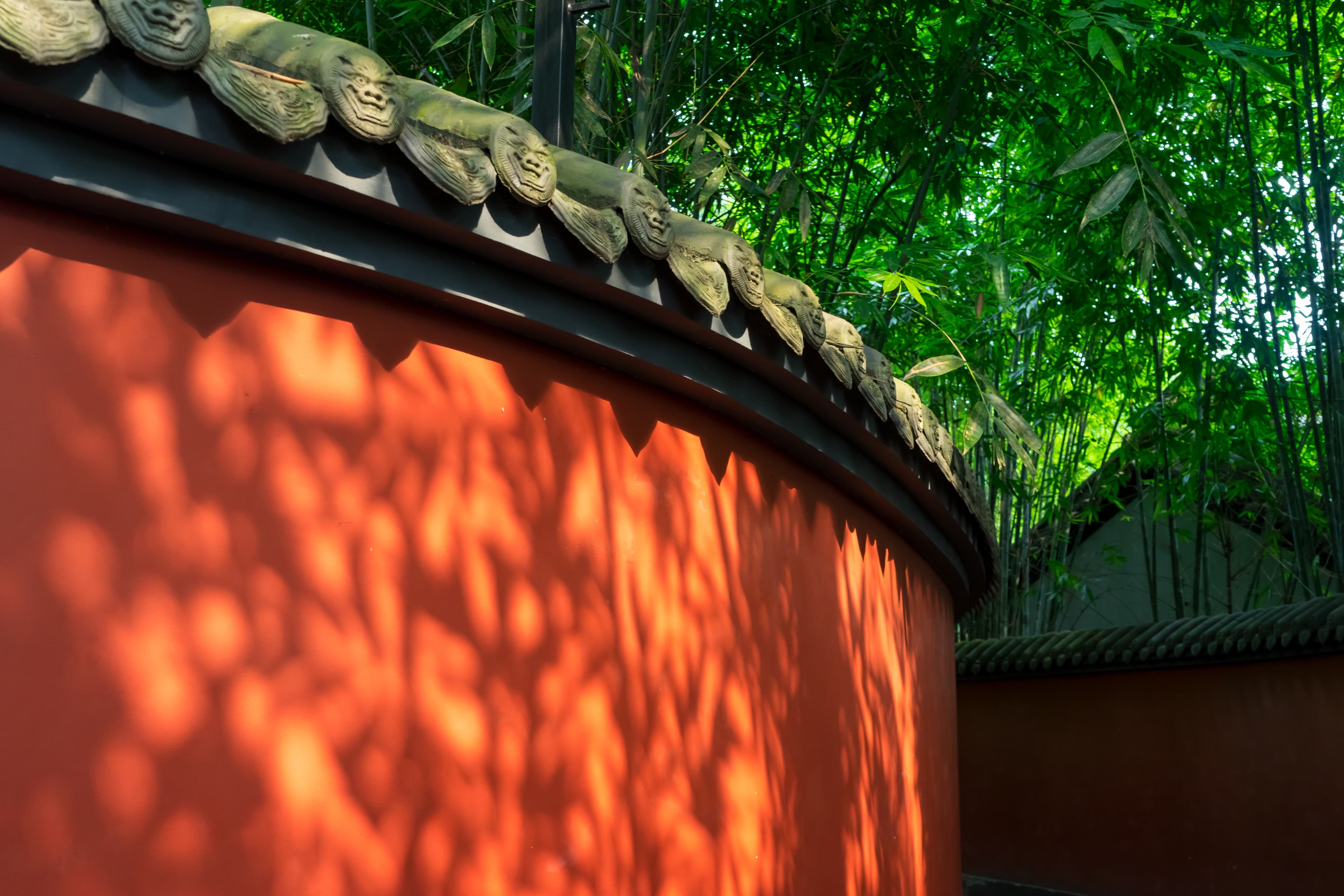 Bamboo shadows along the red walls of Wuhou Shrine